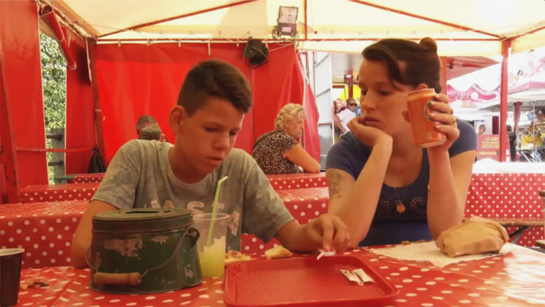 A mother and her son at a festival