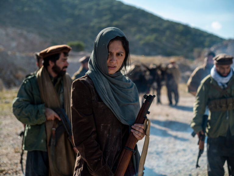 A woman with a rifle